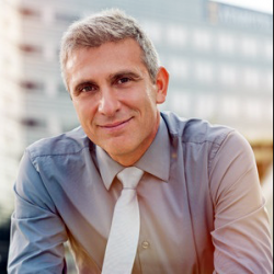 smiling-businessman-299sq-250x250